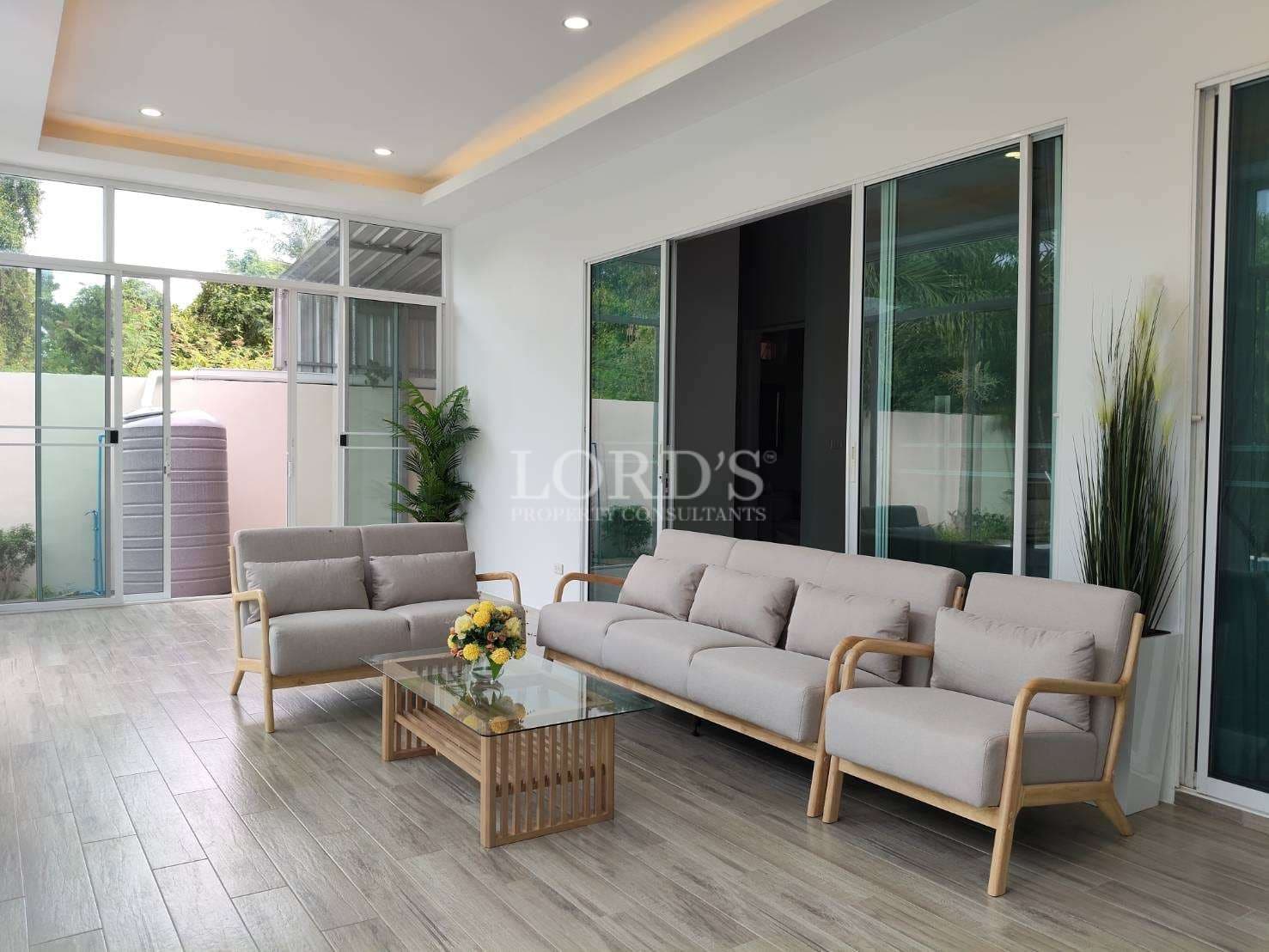 Modern living room with glass walls