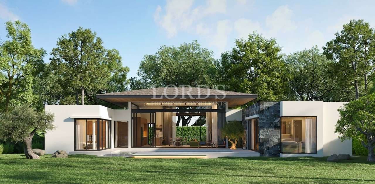 Modern house surrounded by greenery.