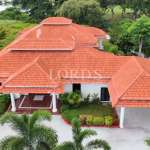 Spacious house with red tiled roof