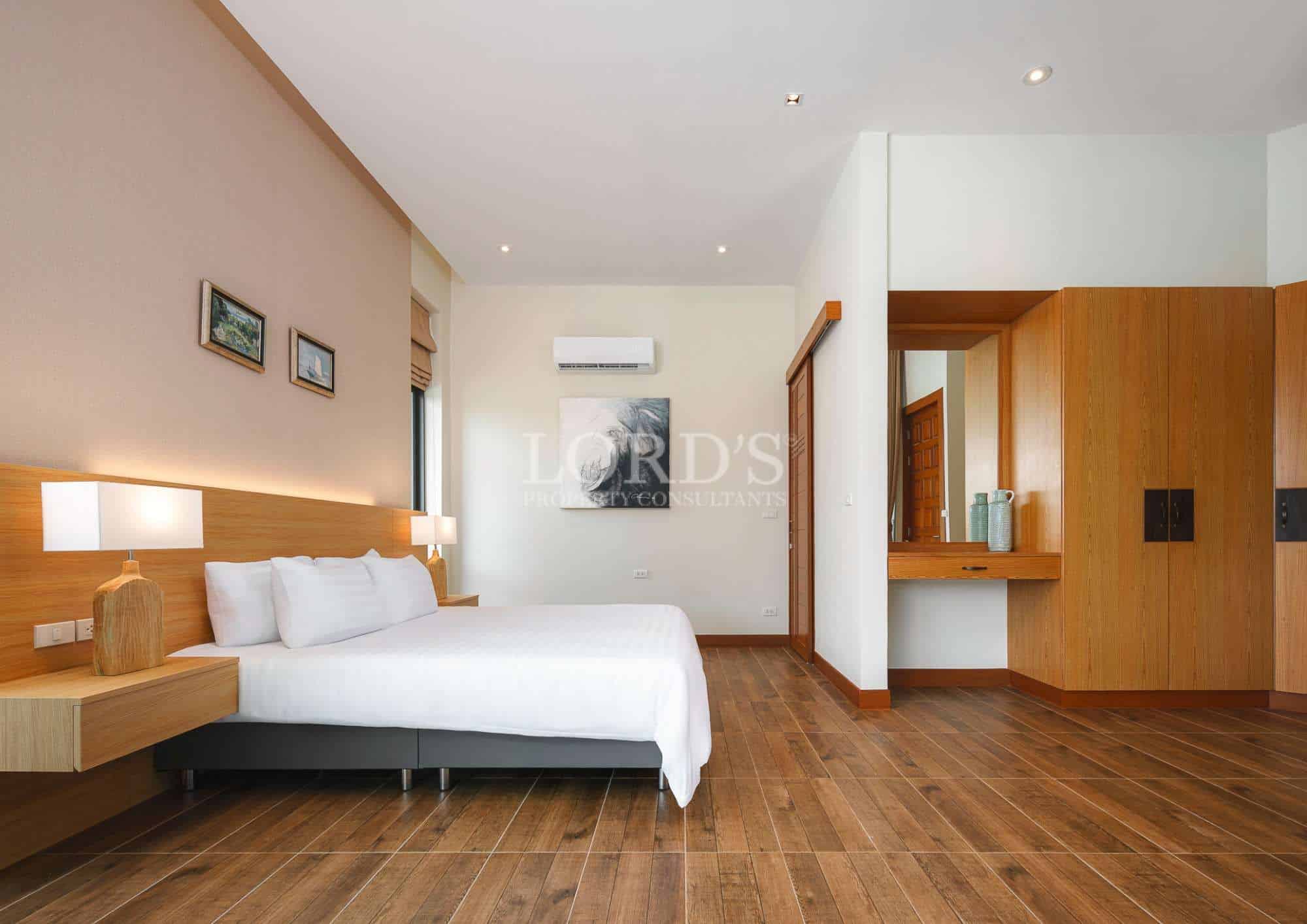 Modern bedroom with wooden accents