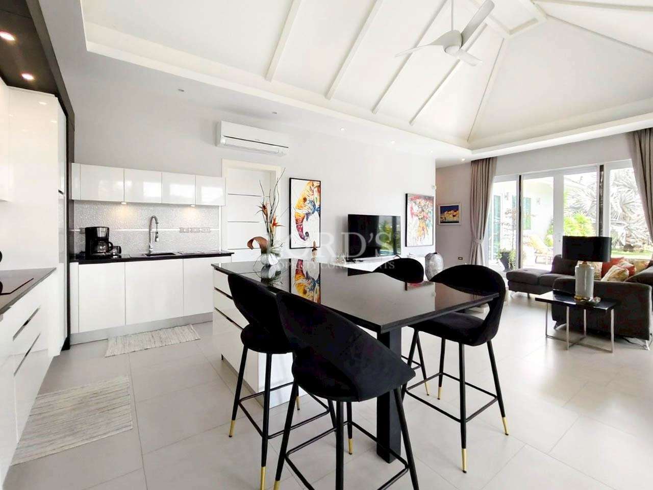 Modern kitchen with stylish furnishings.
