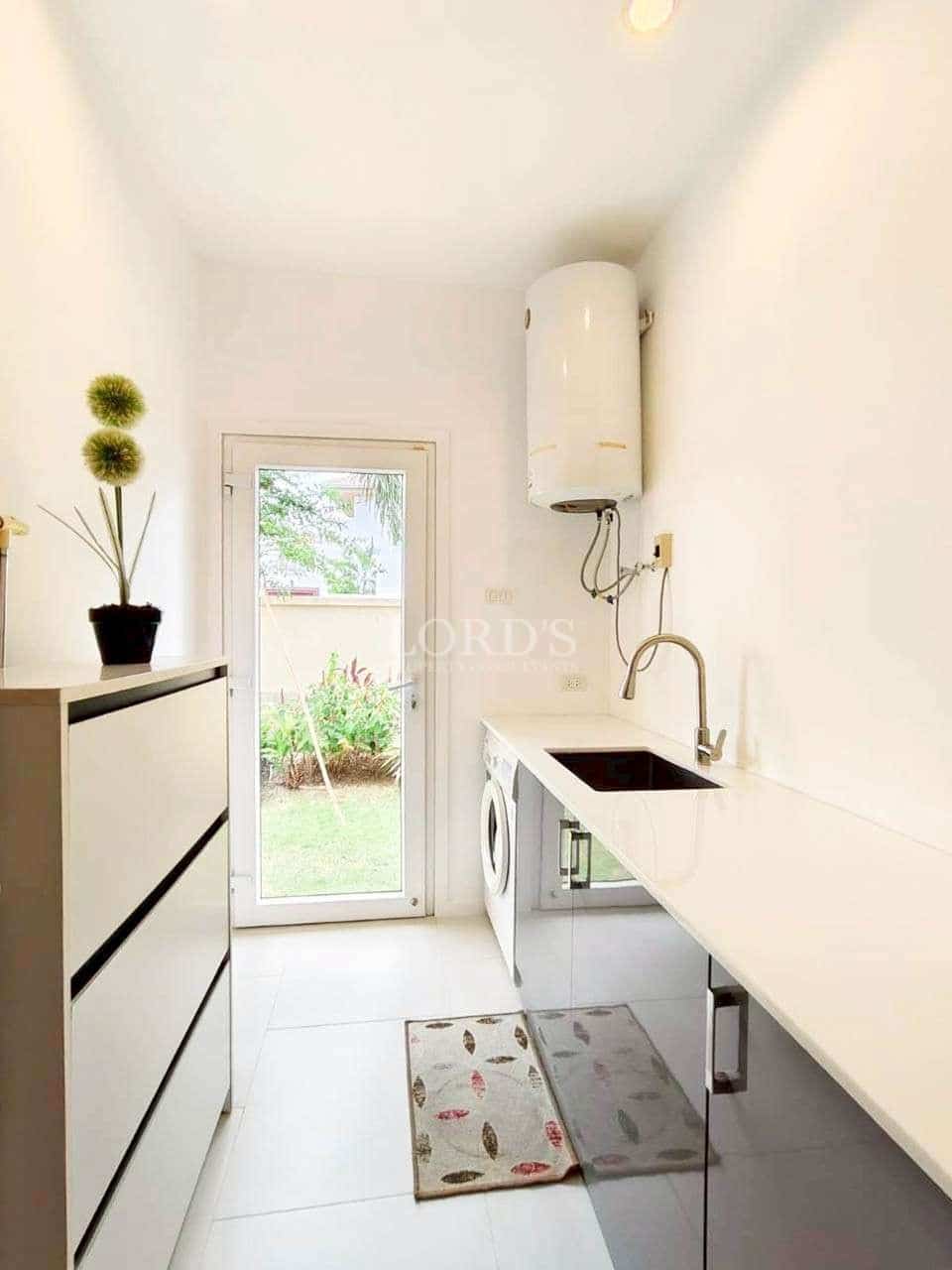 Bright laundry room with garden view