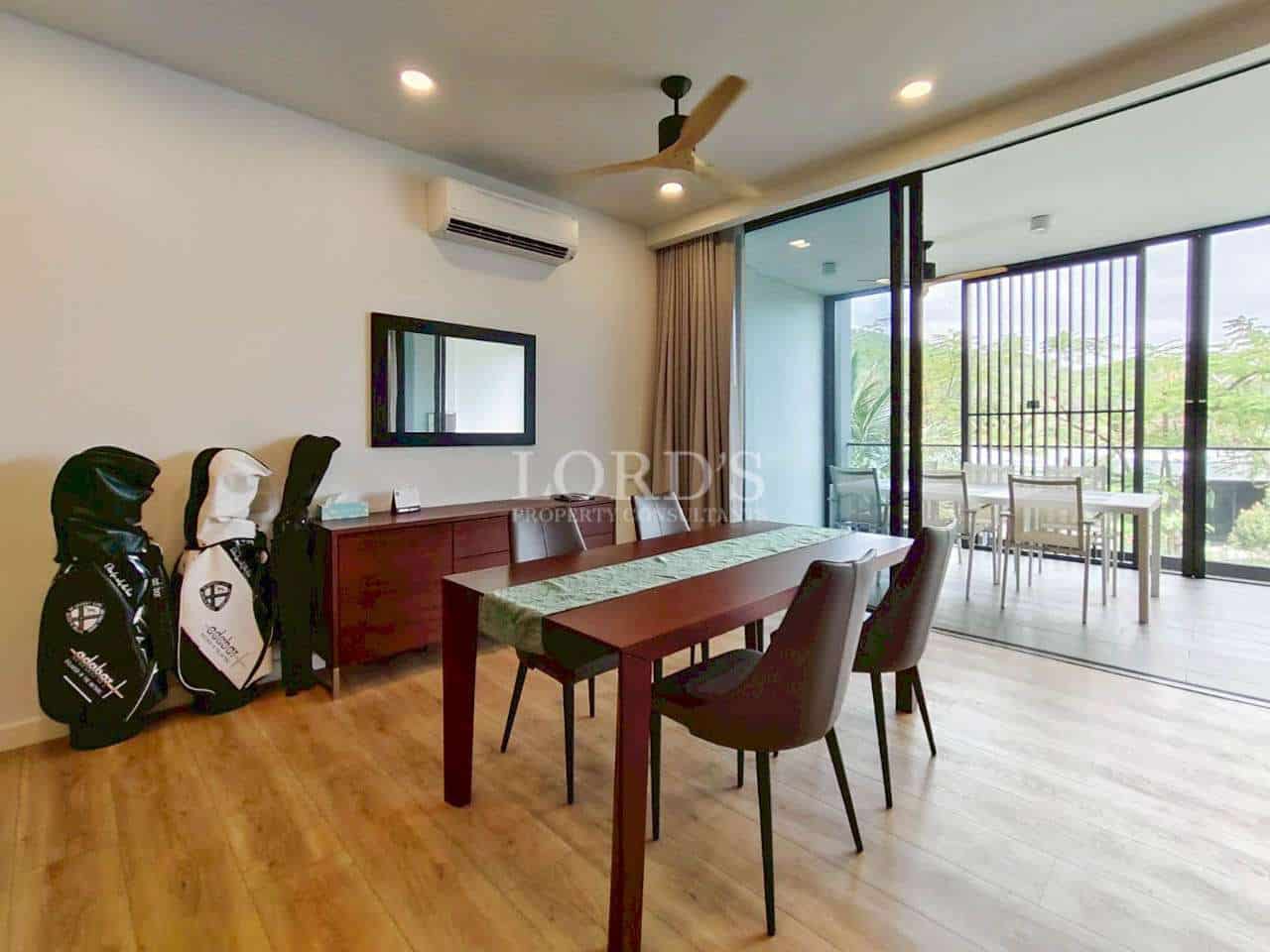 Modern dining area with golf equipment