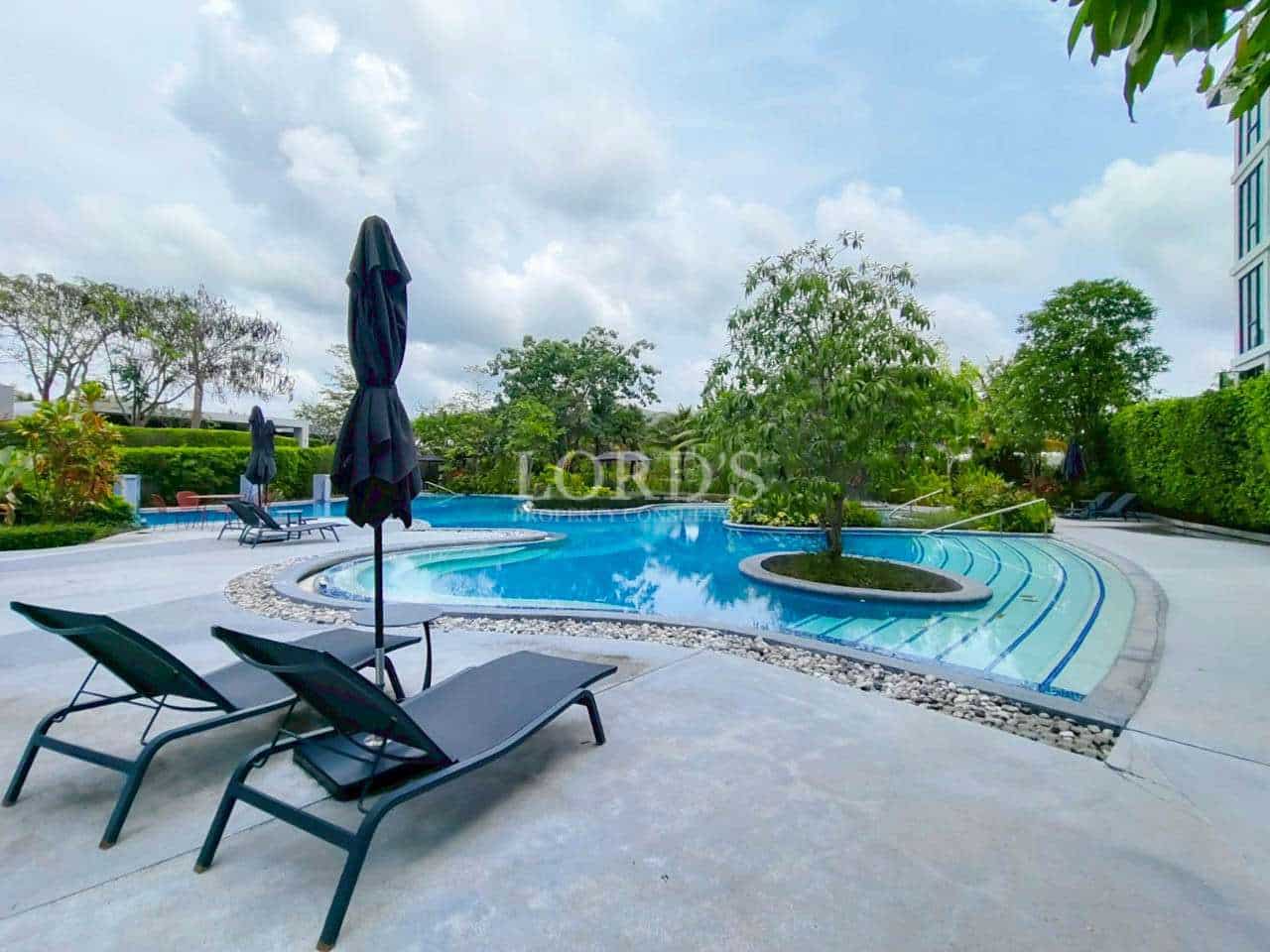 Serene poolside with lounge chairs