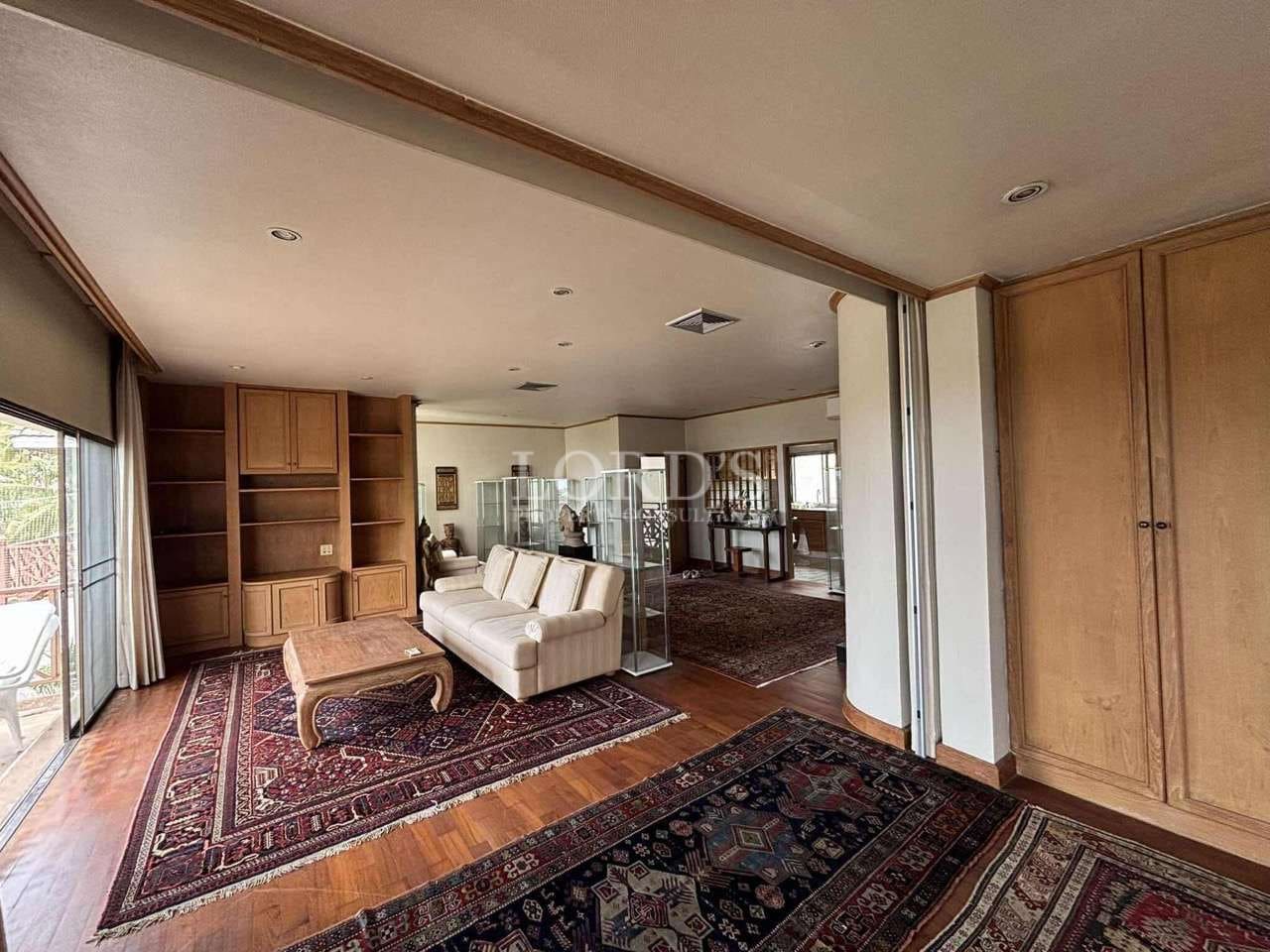 Spacious living area with wooden accents