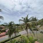 Tropical landscape with palm trees.