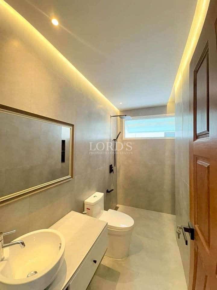Modern bathroom with LED lighting and walk-in shower