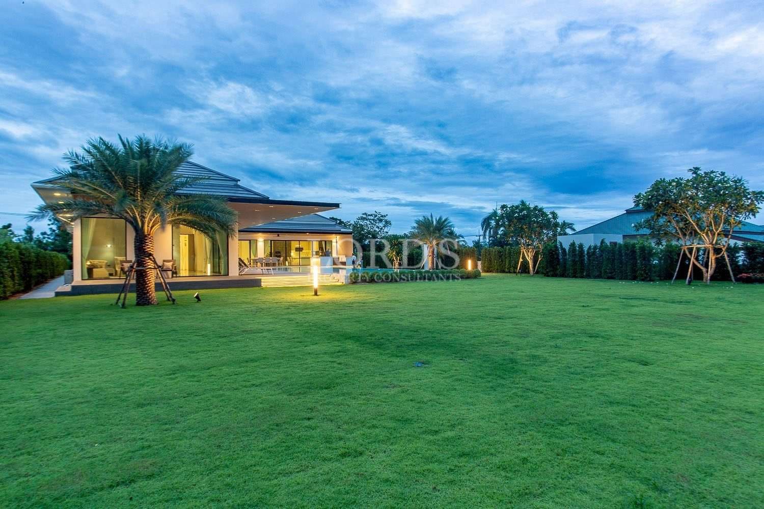 Modern house with lush green lawn