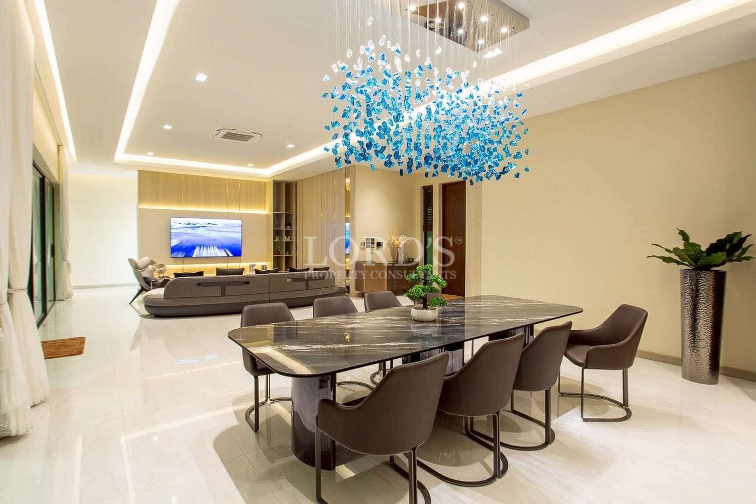 Modern dining area with artistic chandelier