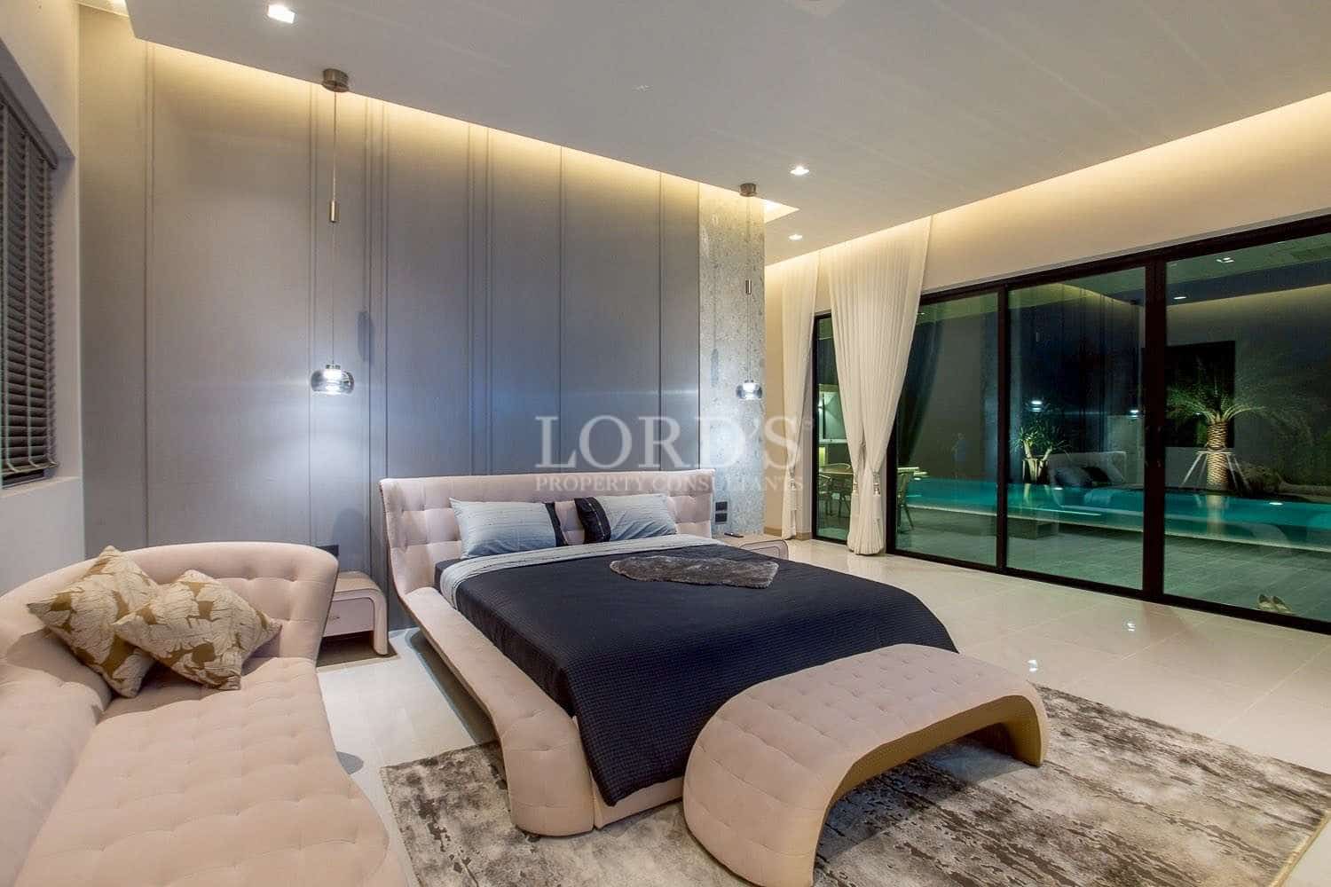 Modern bedroom with pool view