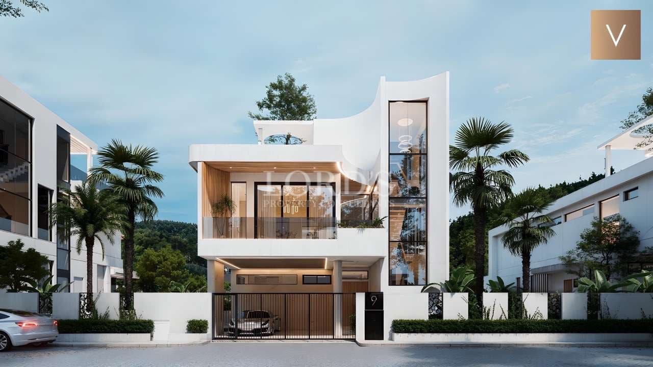 Modern house with tropical landscaping.