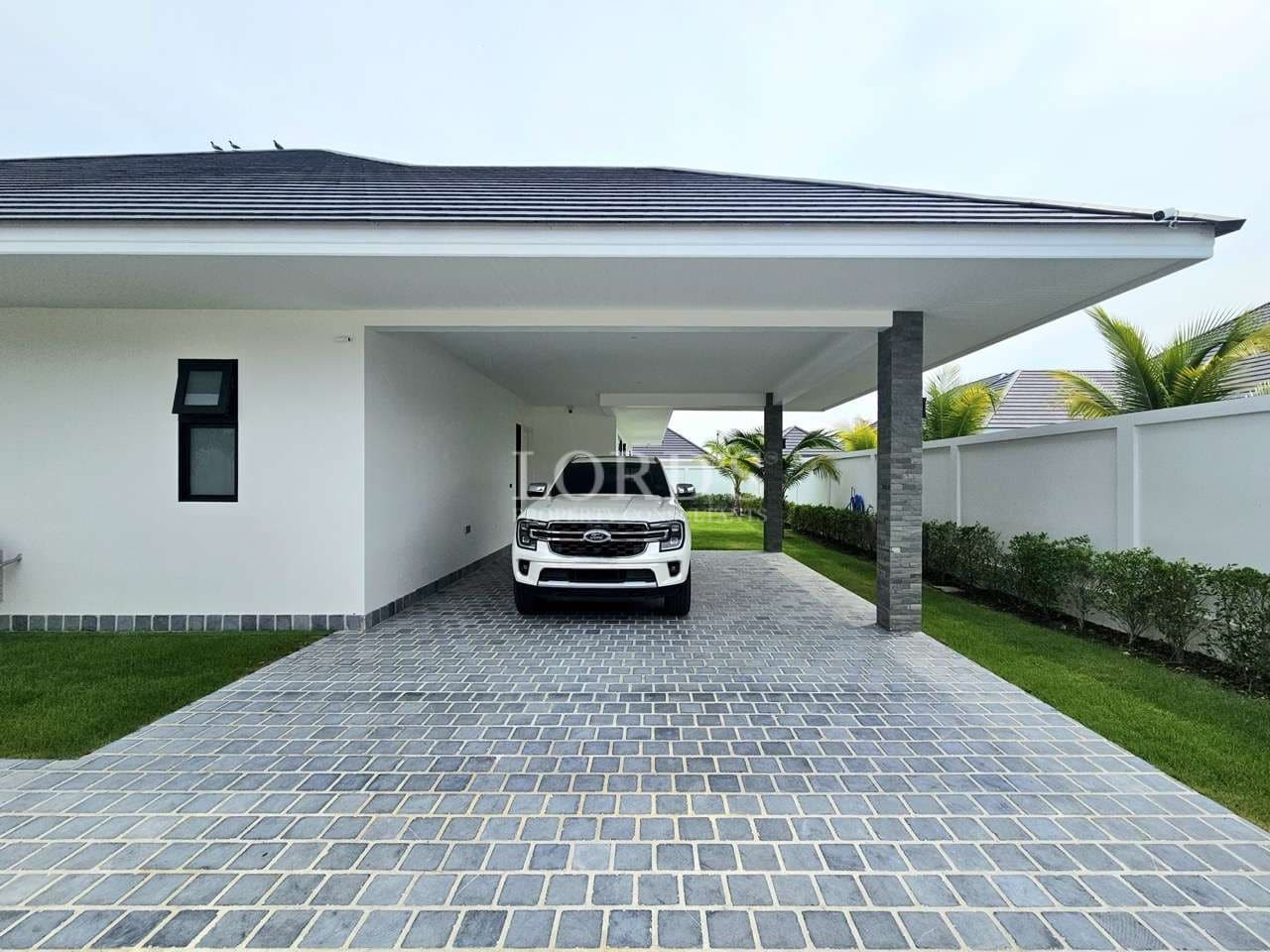 Car parked under modern carport