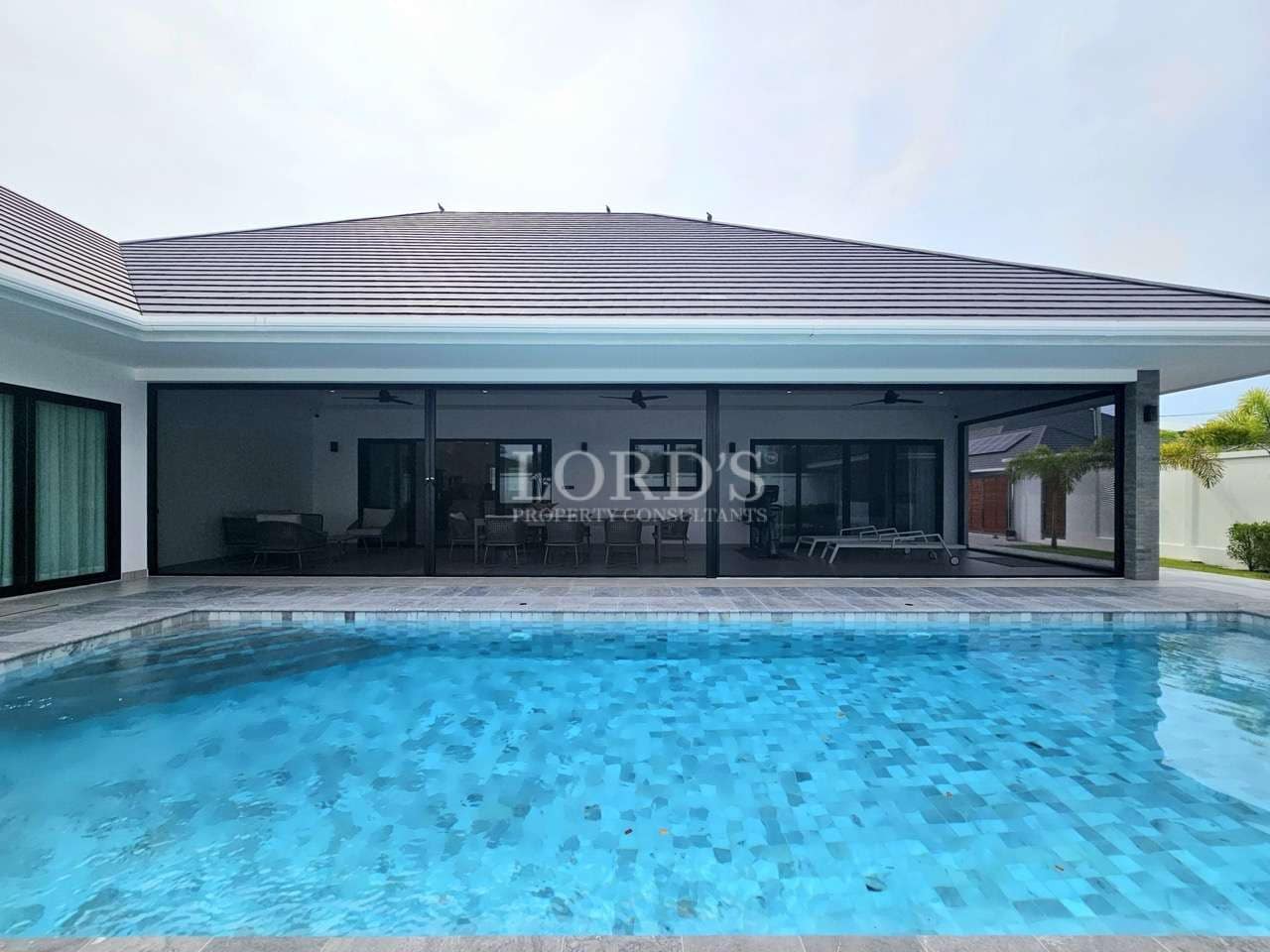 Modern villa with pool and patio