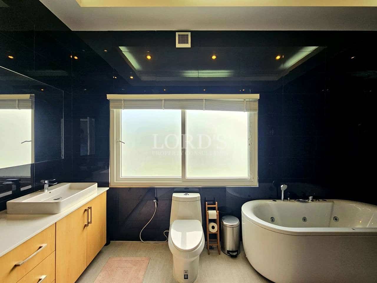 Modern bathroom with large window