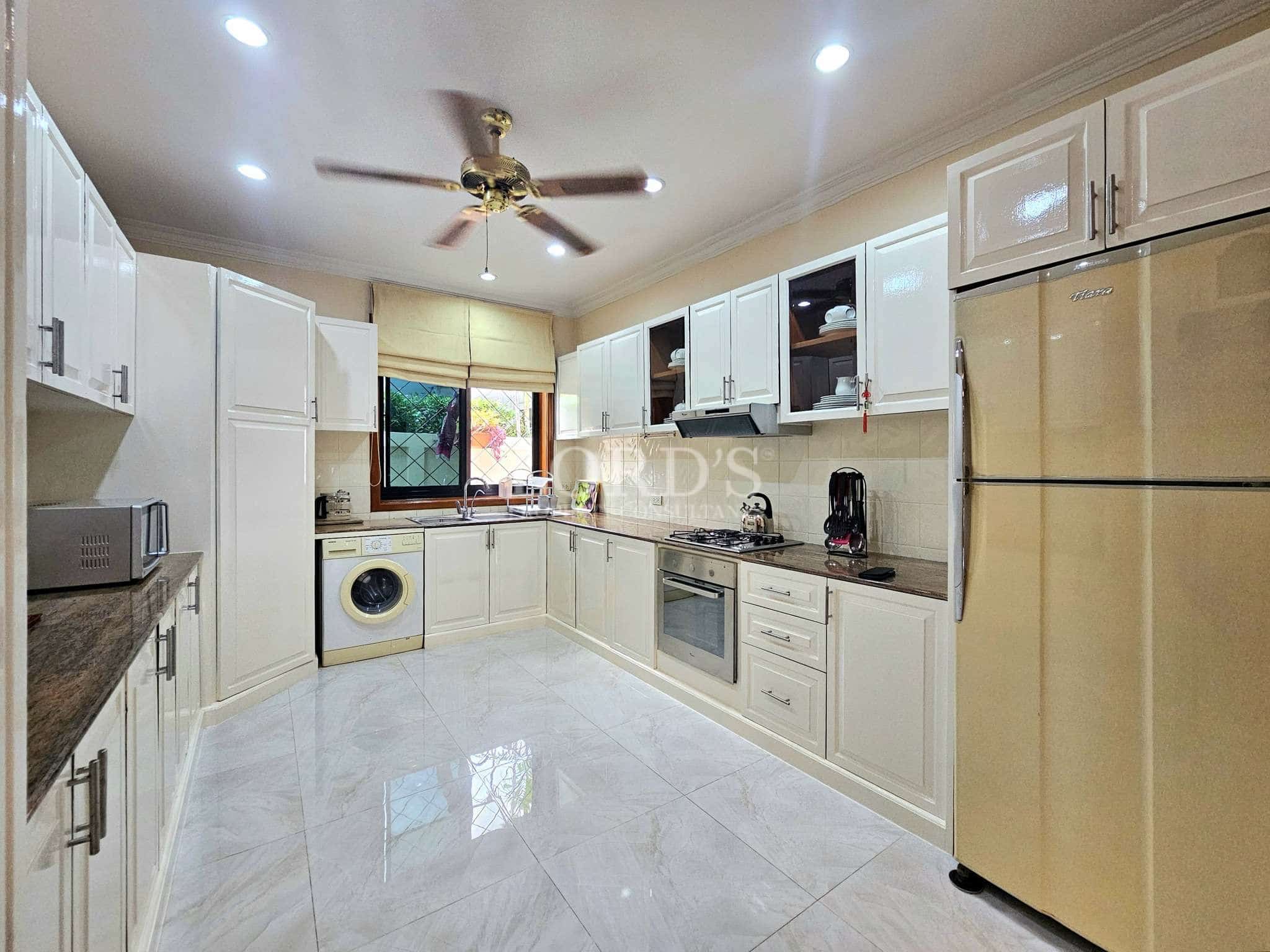 Modern kitchen with white cabinets