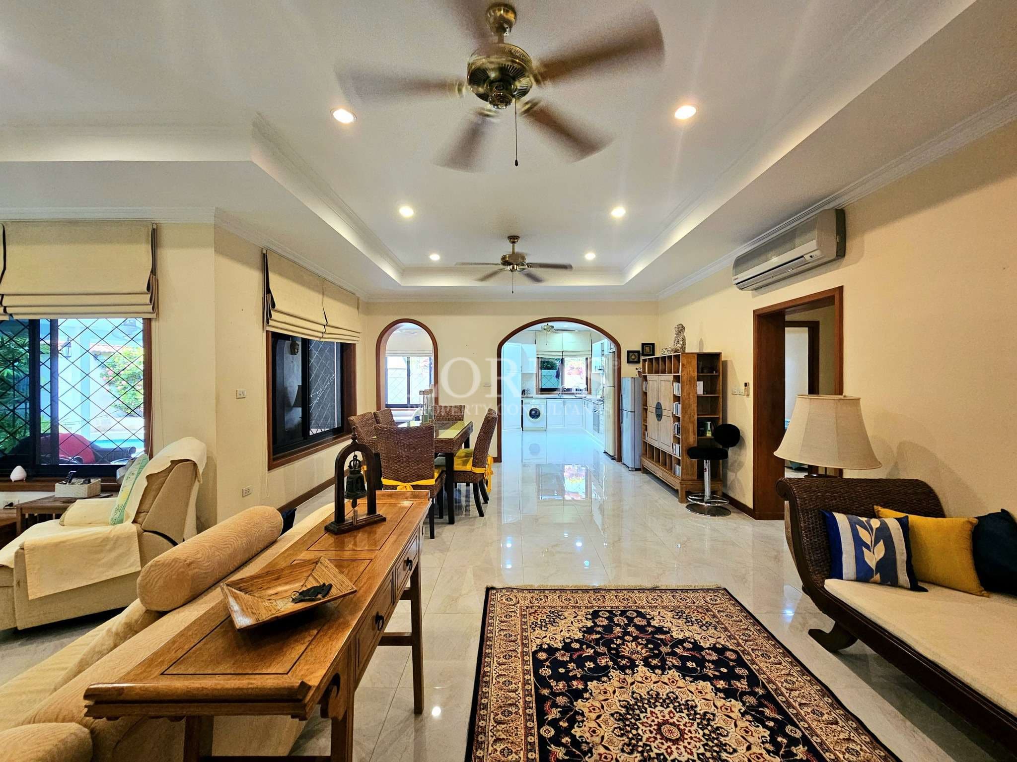 Spacious, elegant living room interior.