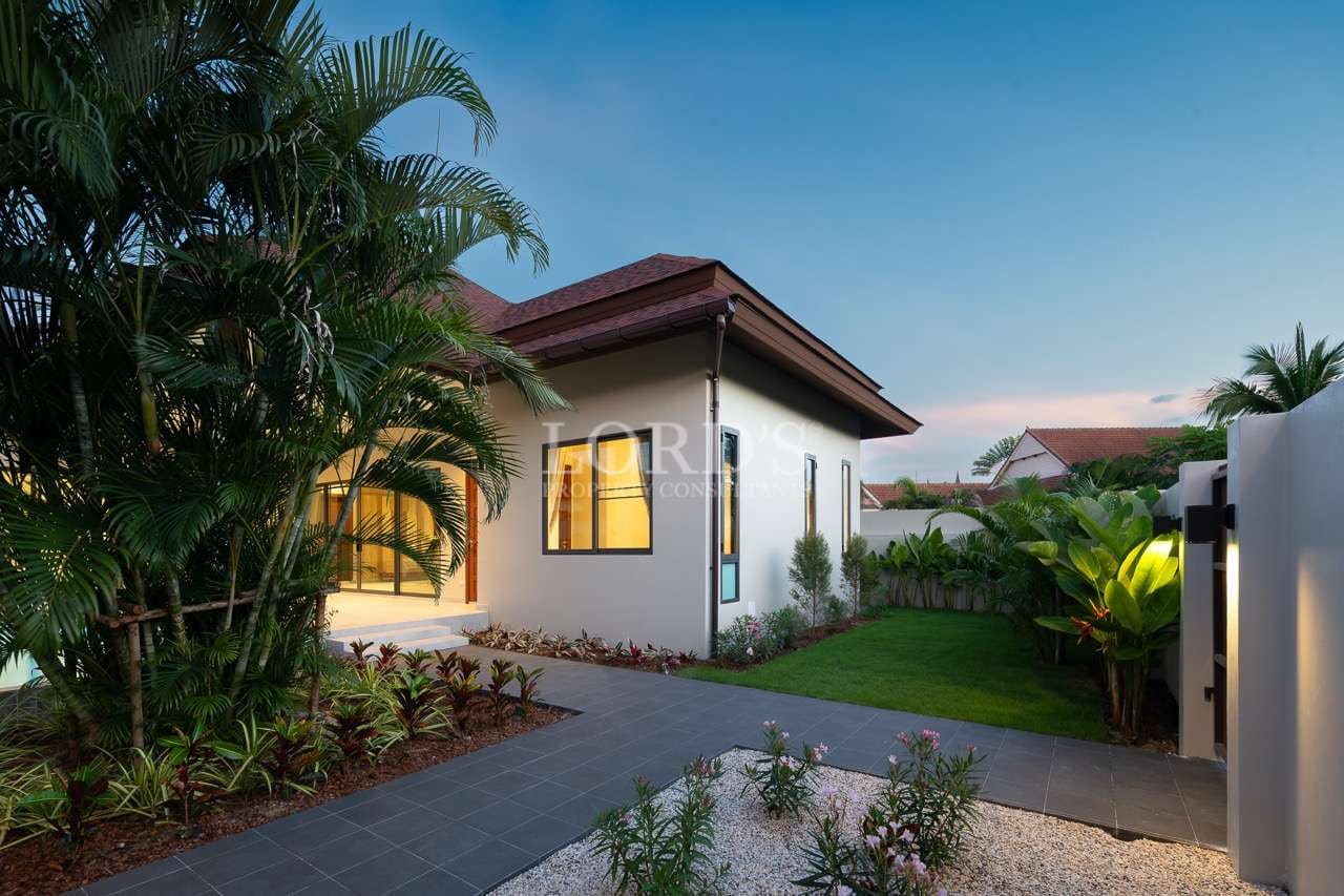 Modern house with landscaped garden.