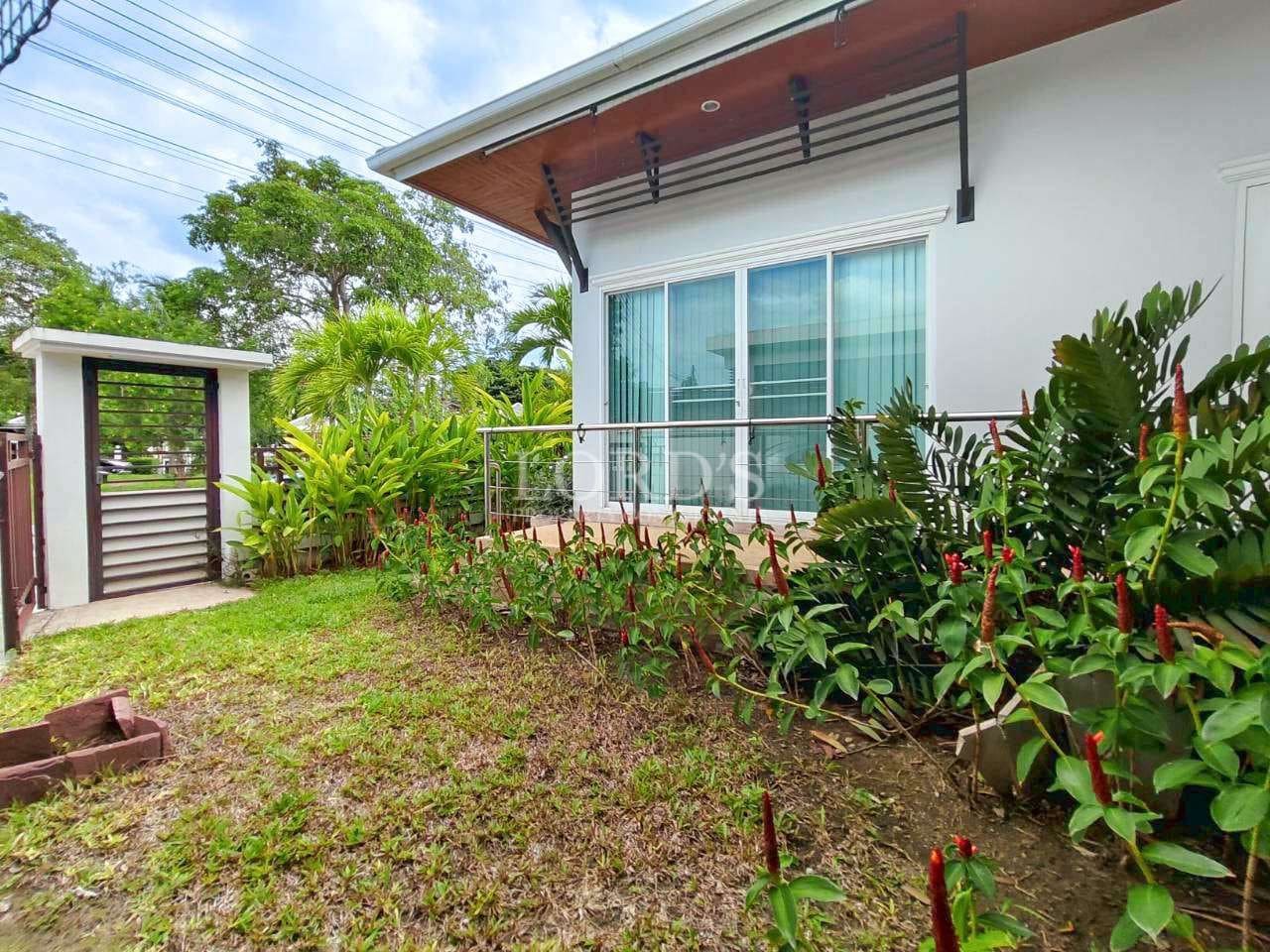 Modern house with garden and greenery