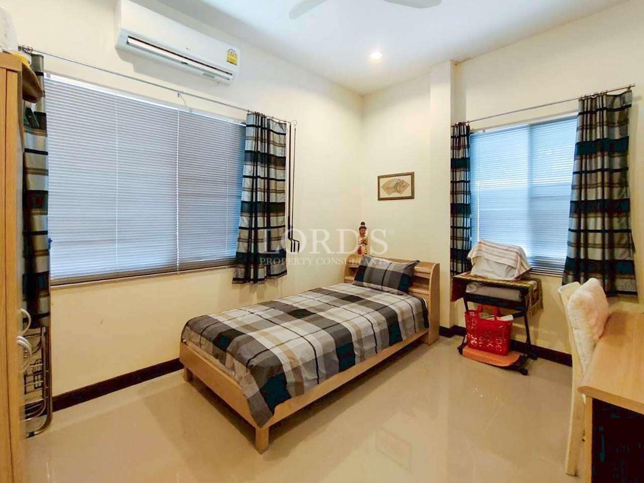 Cozy bedroom with simple furnishings.