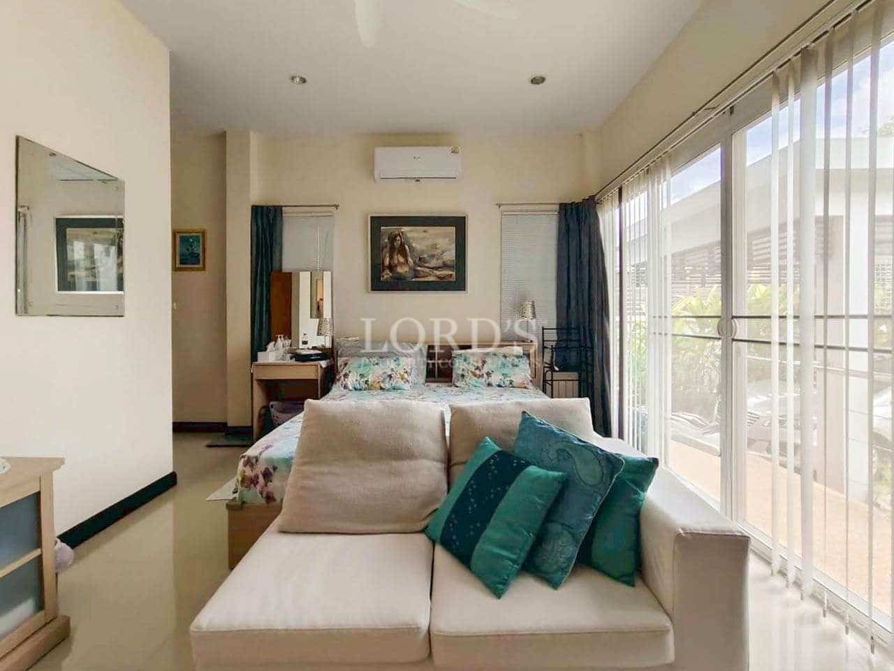 Cozy bedroom with natural light.