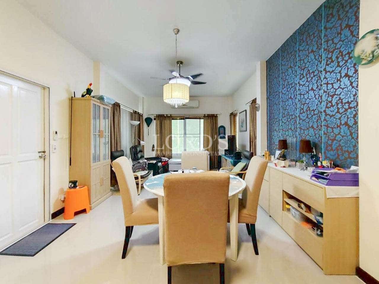 Modern dining area with decorative wall