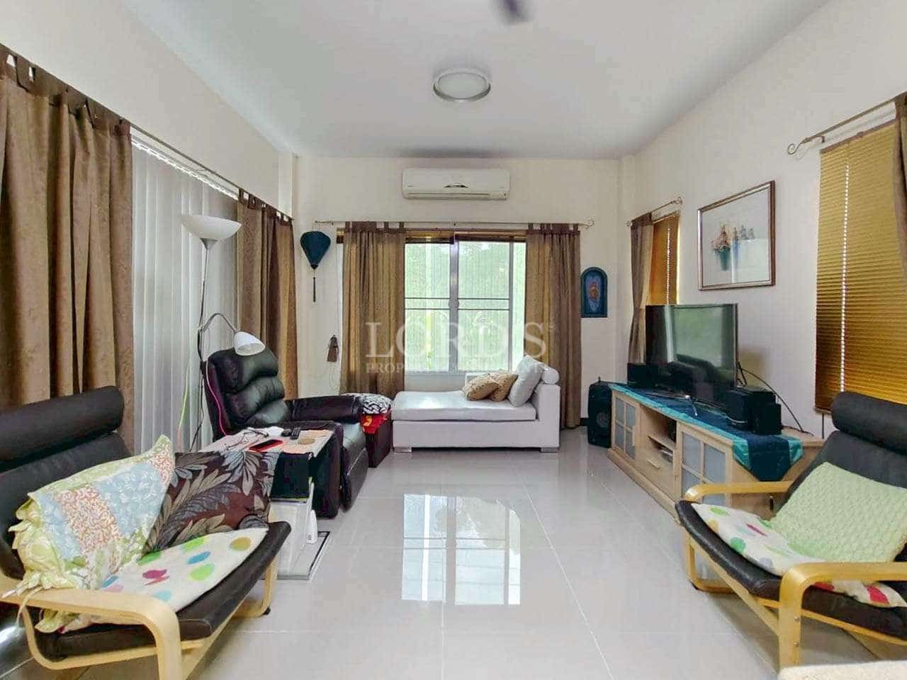 Modern living room with comfortable seating.