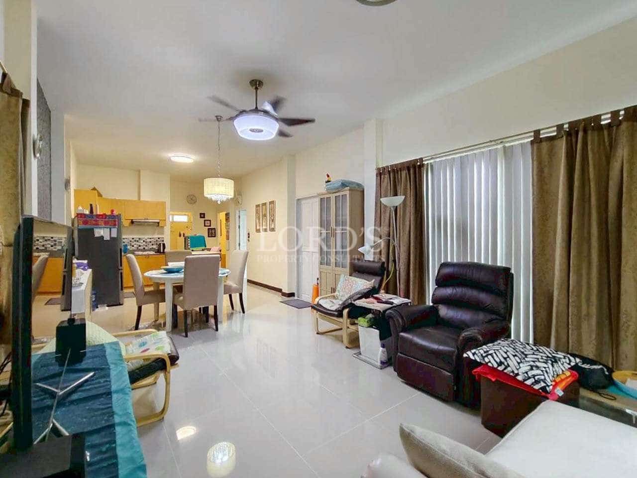 Spacious living area with modern furniture.