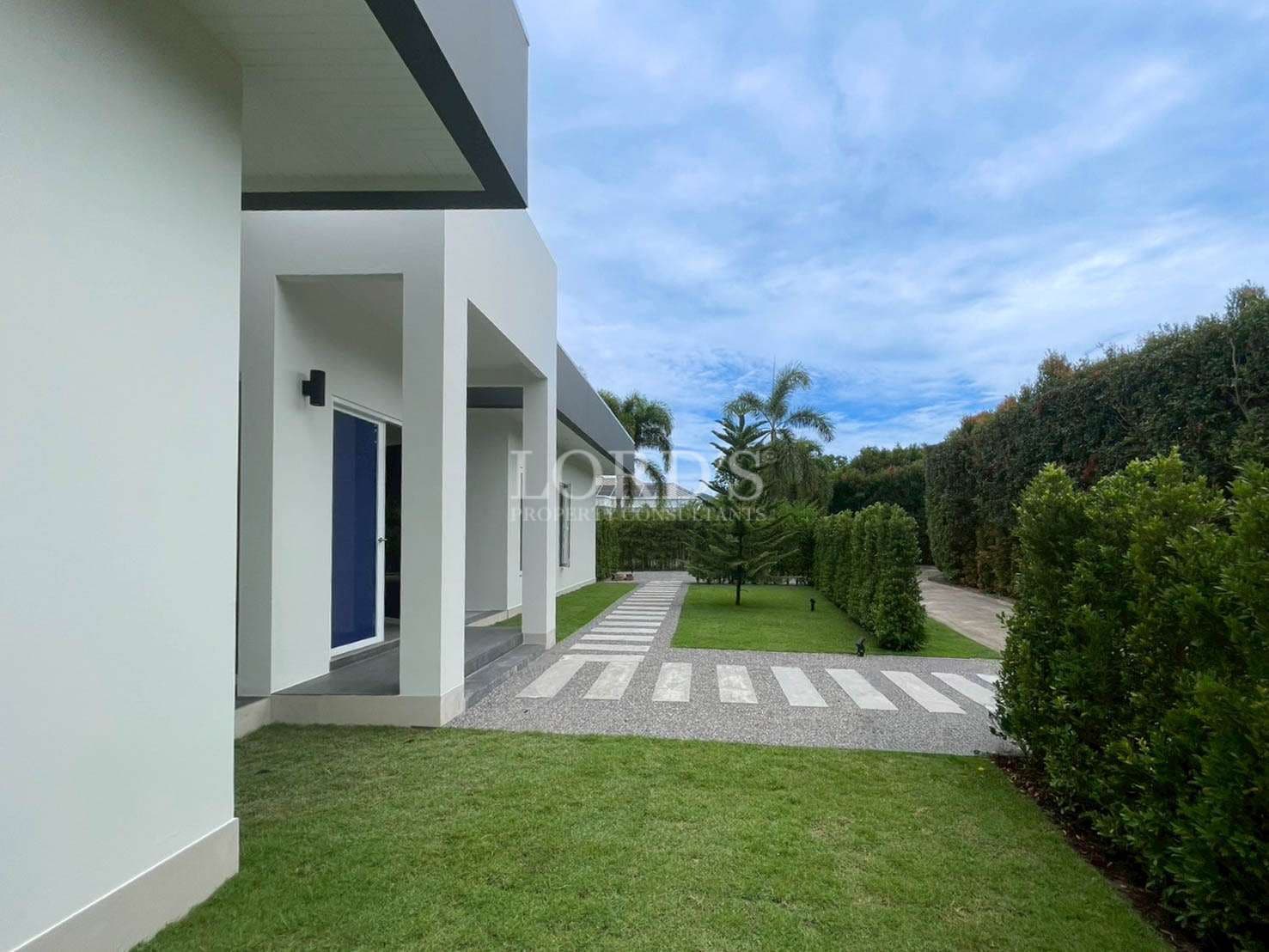 Modern house with landscaped garden.