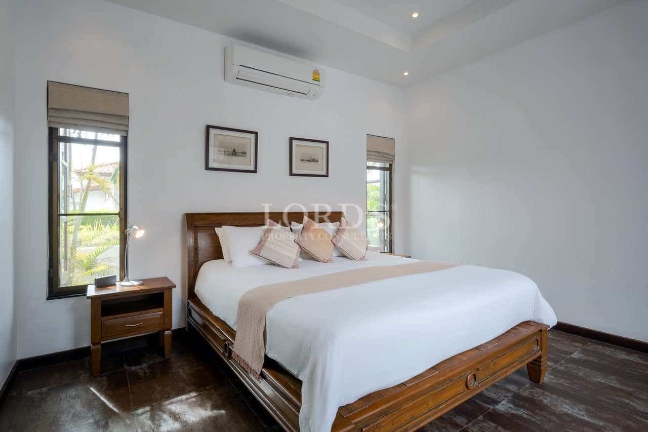 Modern bedroom with wooden furniture