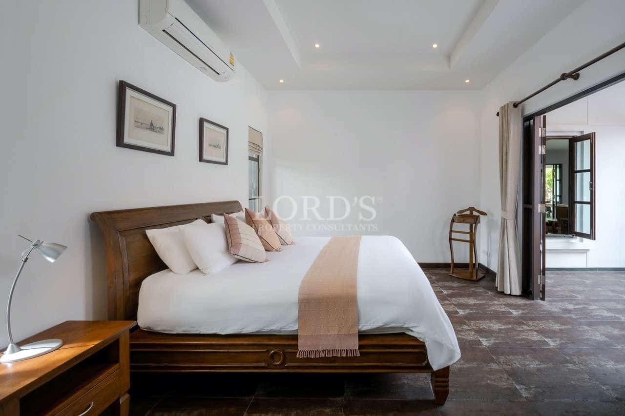 Modern bedroom with wooden furniture