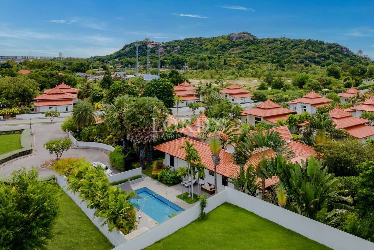 Tropical resort with lush greenery.