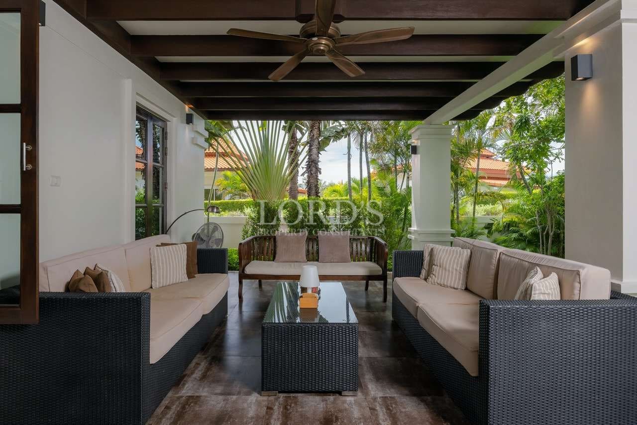 Elegant outdoor seating area with greenery