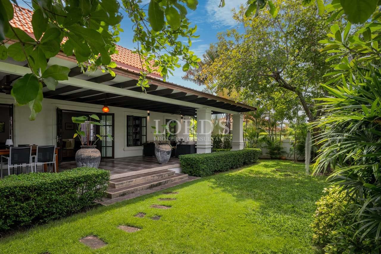 Lush garden surrounding a charming house