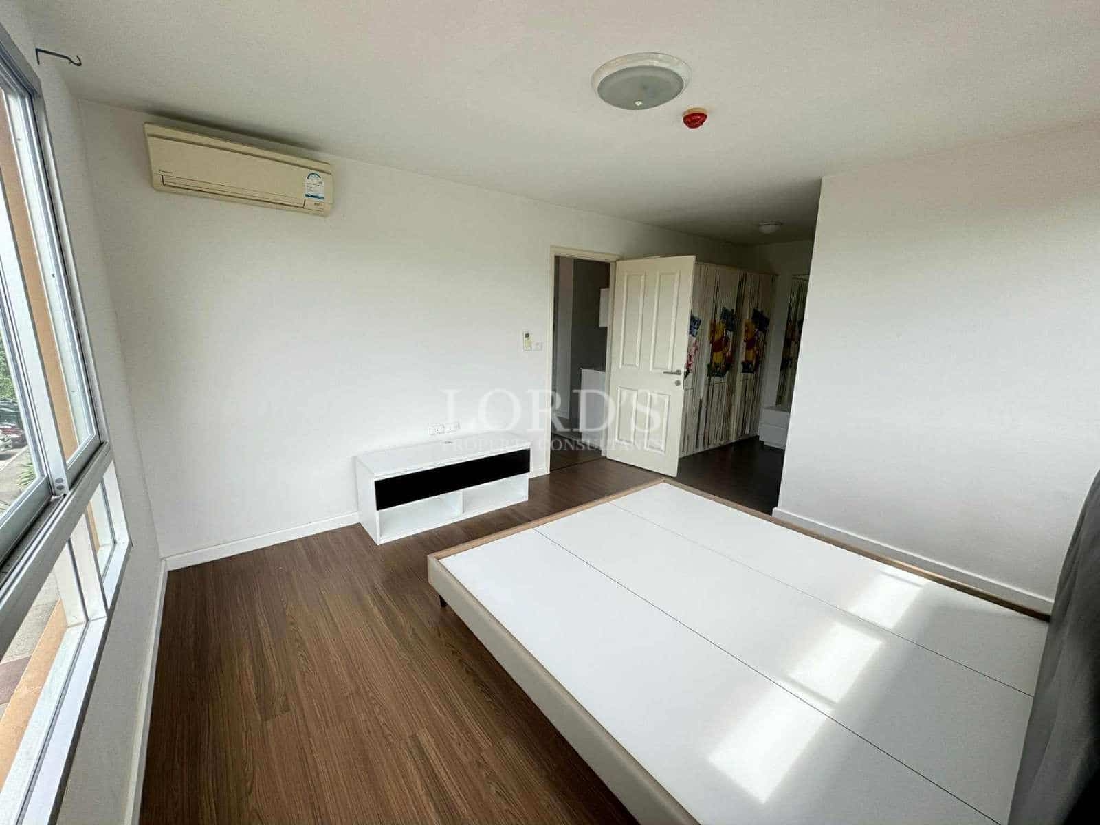 Empty room with minimal furniture