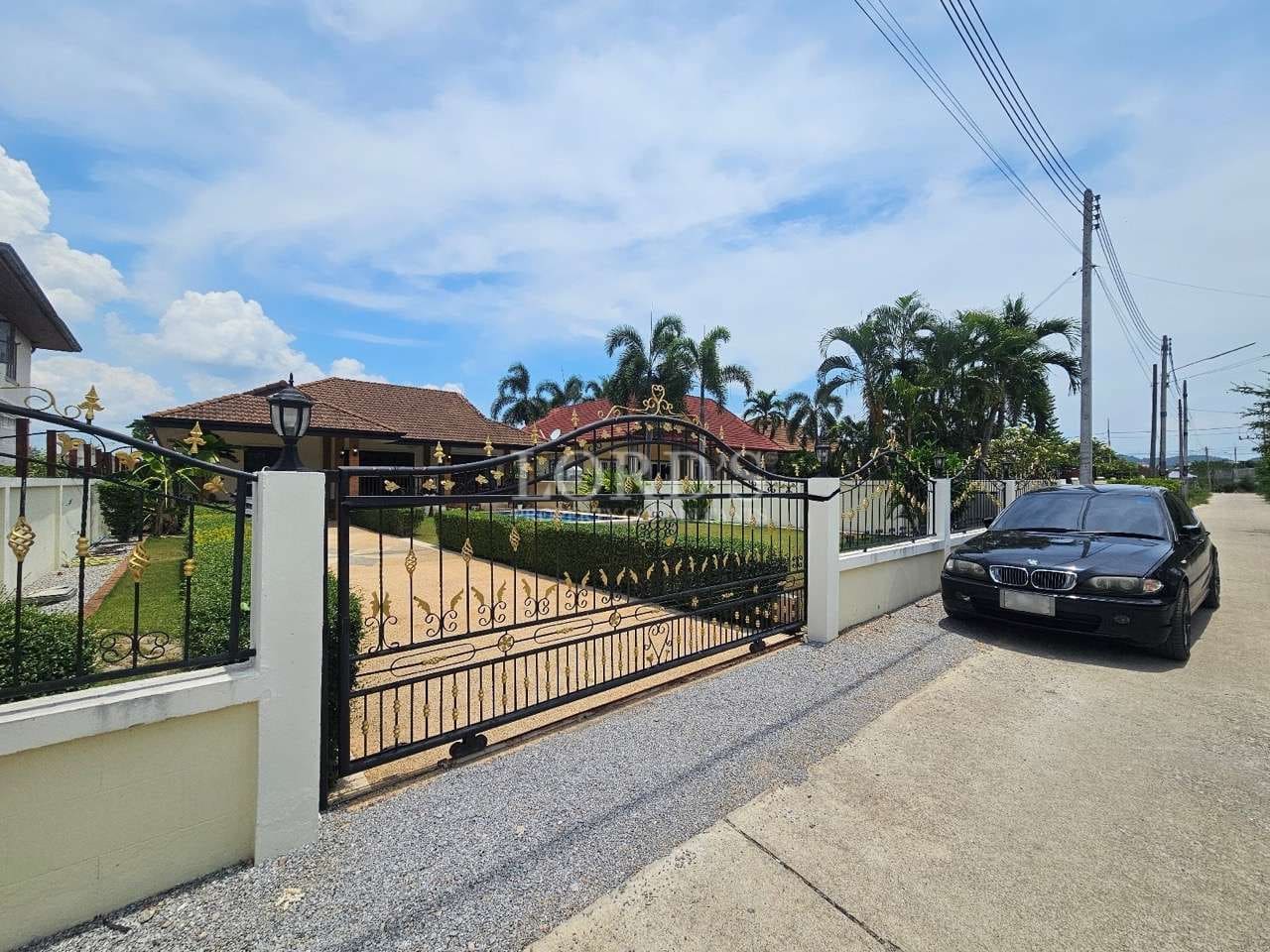 Elegant house with gated entrance.