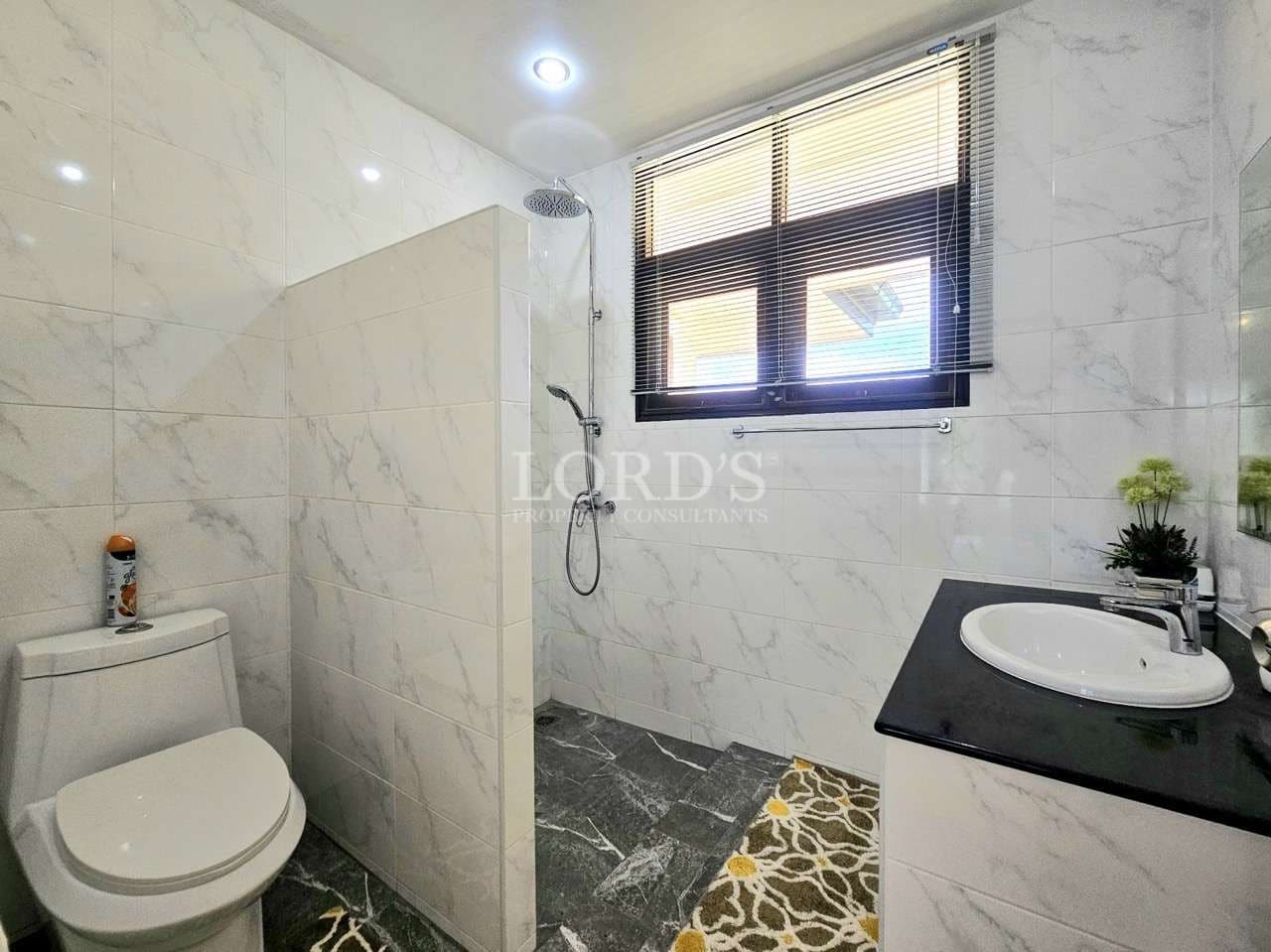 Modern bathroom with shower and toilet