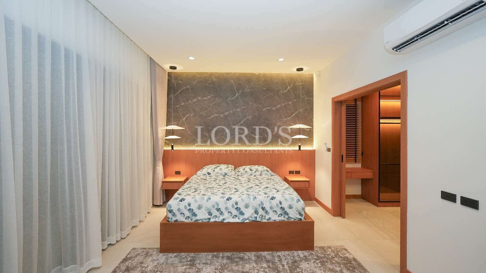 Modern bedroom with elegant decor.