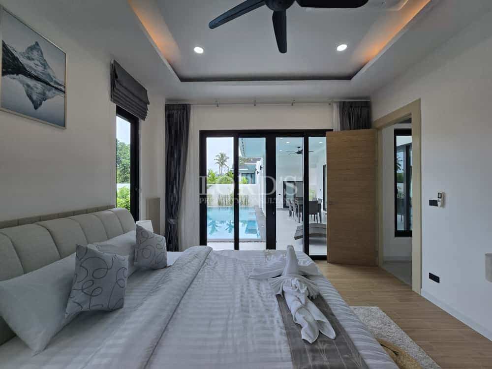 Modern bedroom with pool view