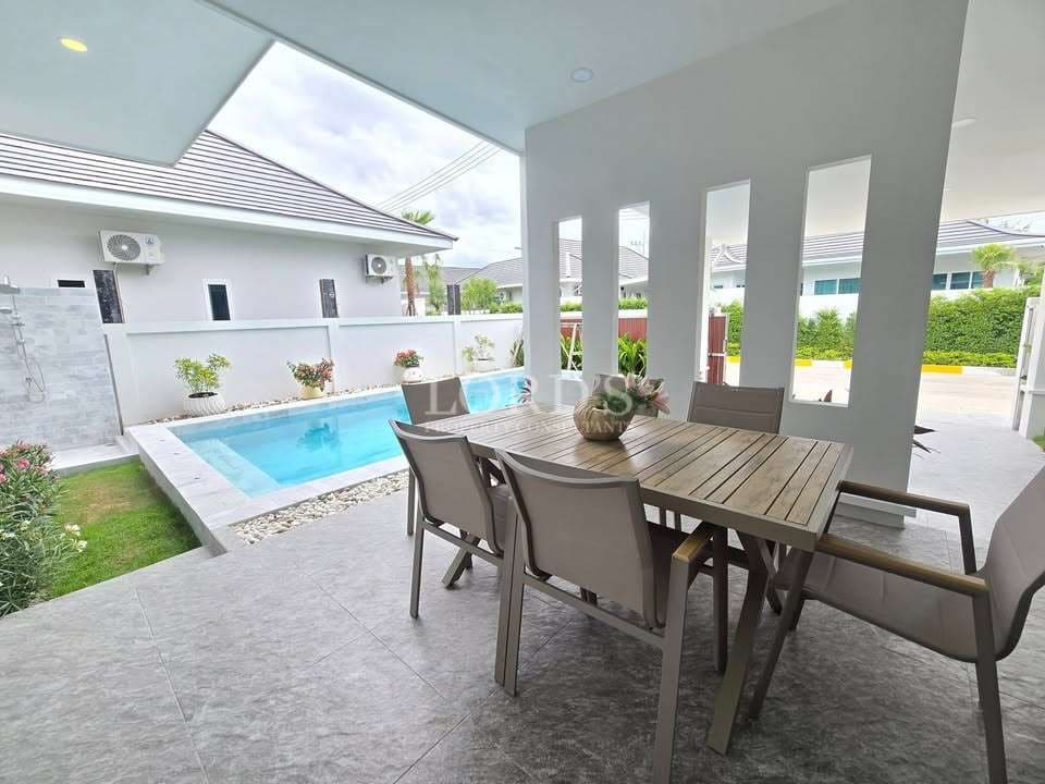 Modern patio with pool view