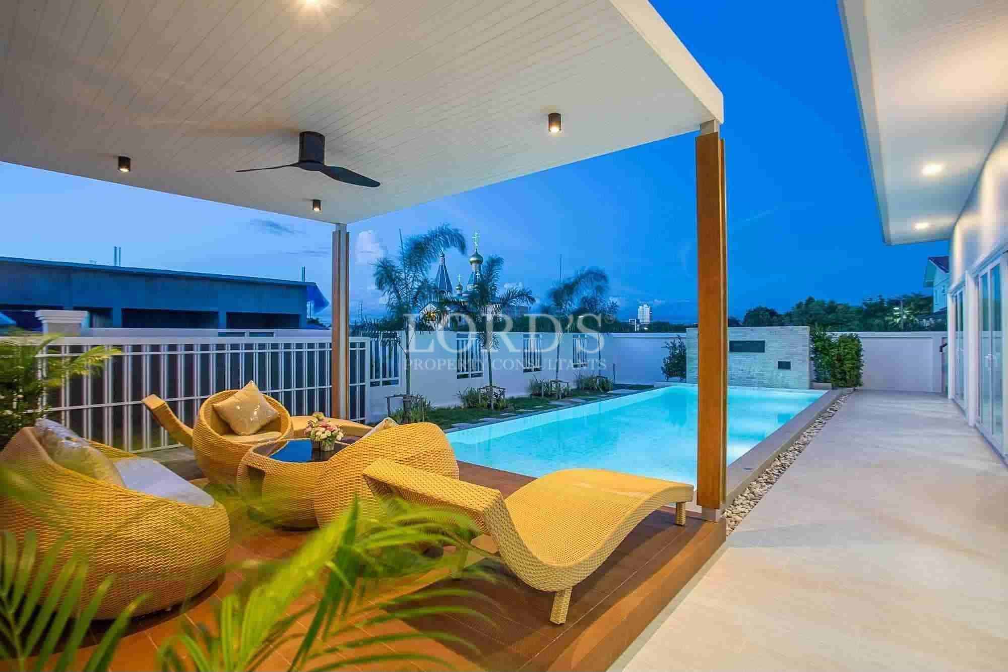 Modern patio with pool and lounge