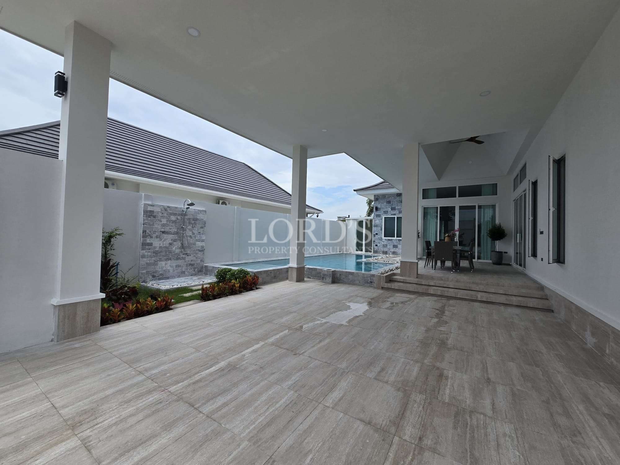 Modern patio with pool view