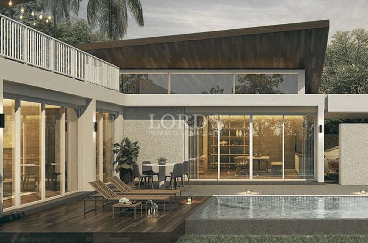 Modern luxury villa exterior with private pool, wooden deck, and large glass doors.