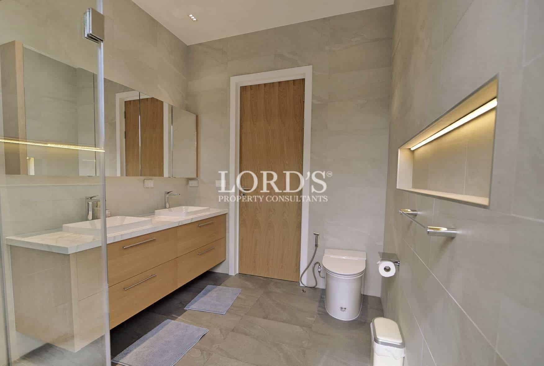 Modern bathroom with wooden accents