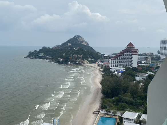 Coastal view with mountain backdrop.