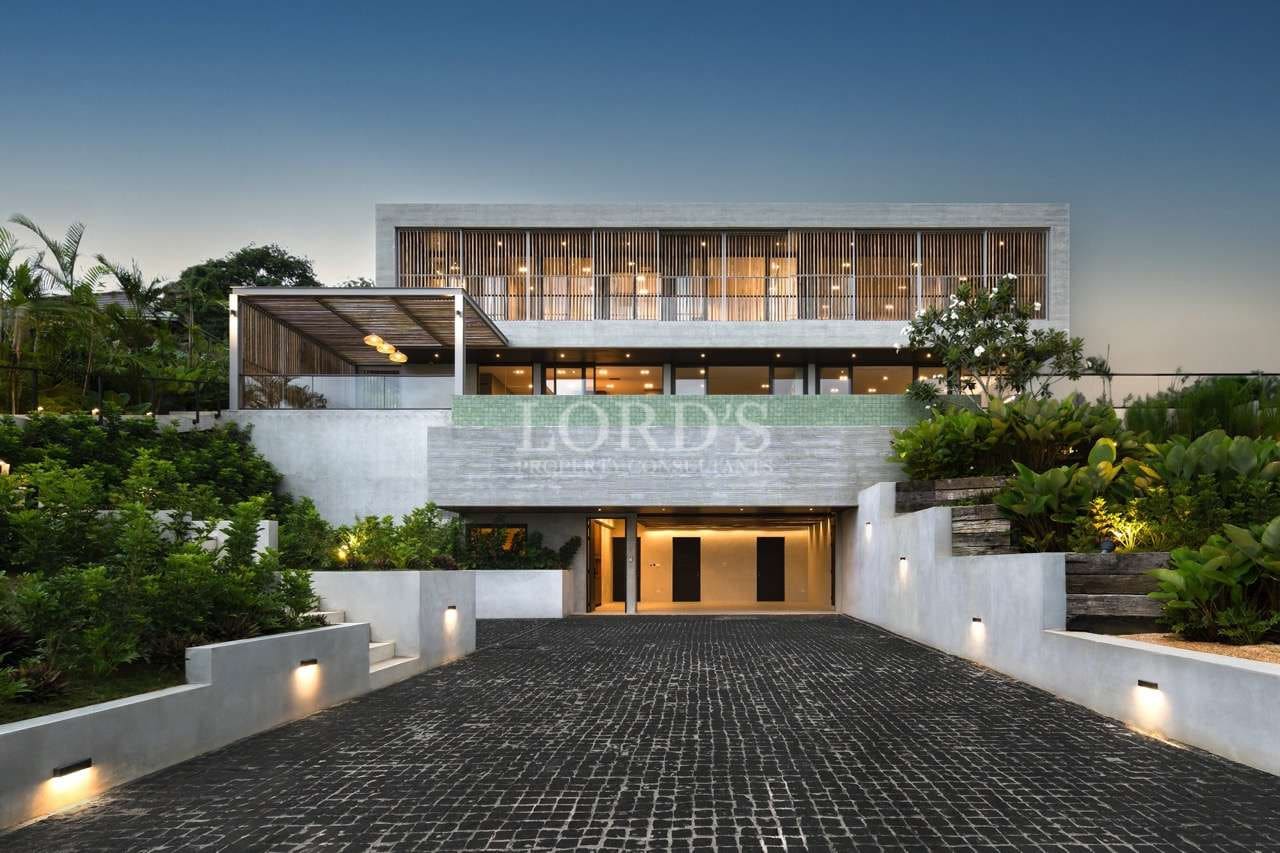 Modern house with landscaped entrance.