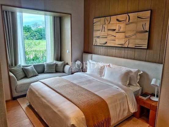 Modern bedroom with cozy seating area