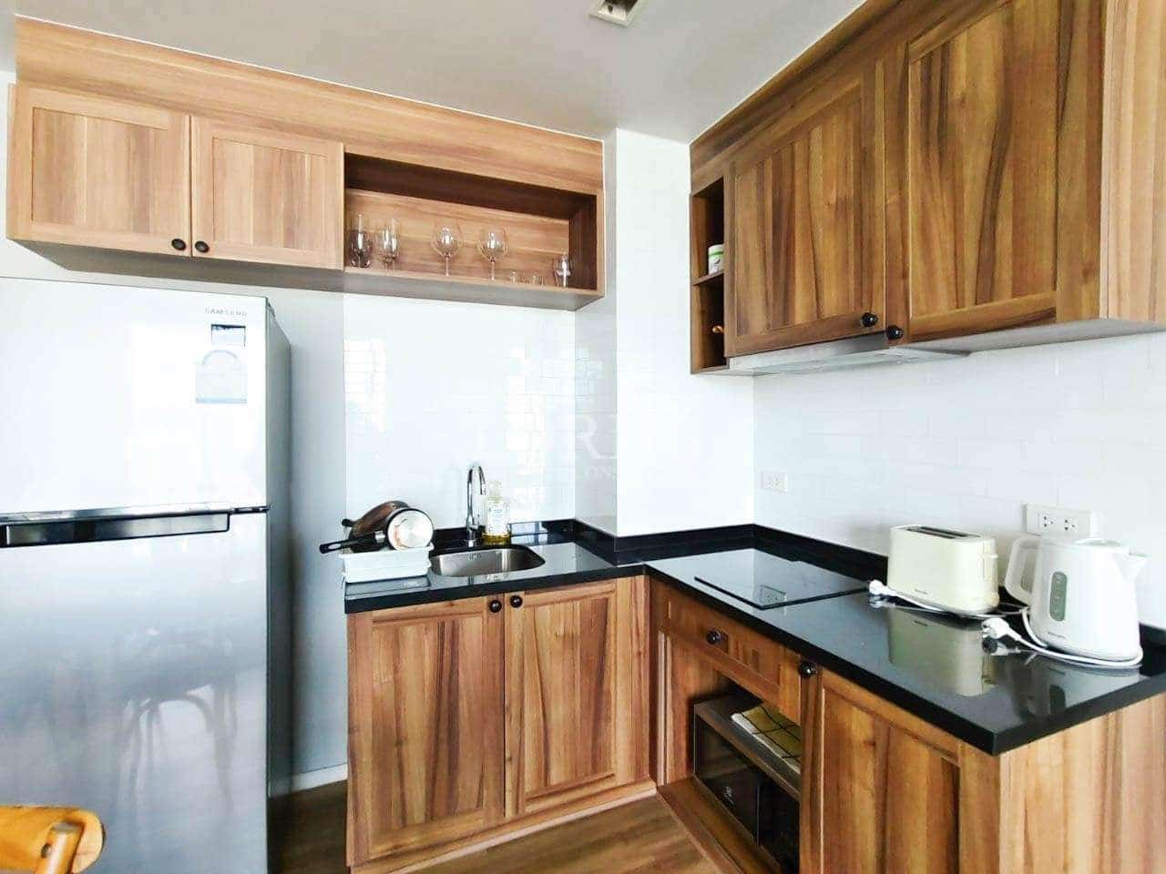 Modern wooden kitchen with appliances