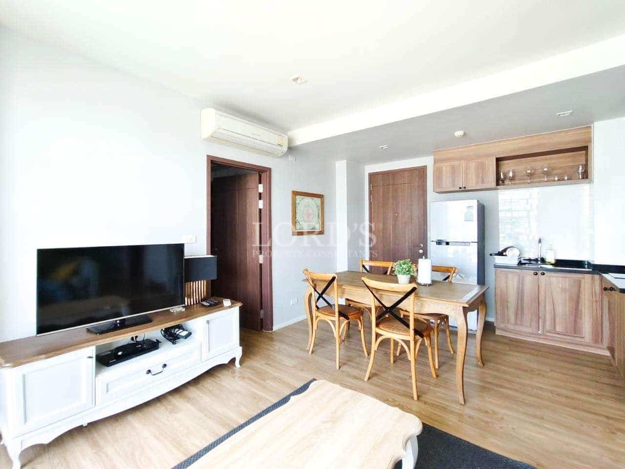 Modern living room with kitchen area