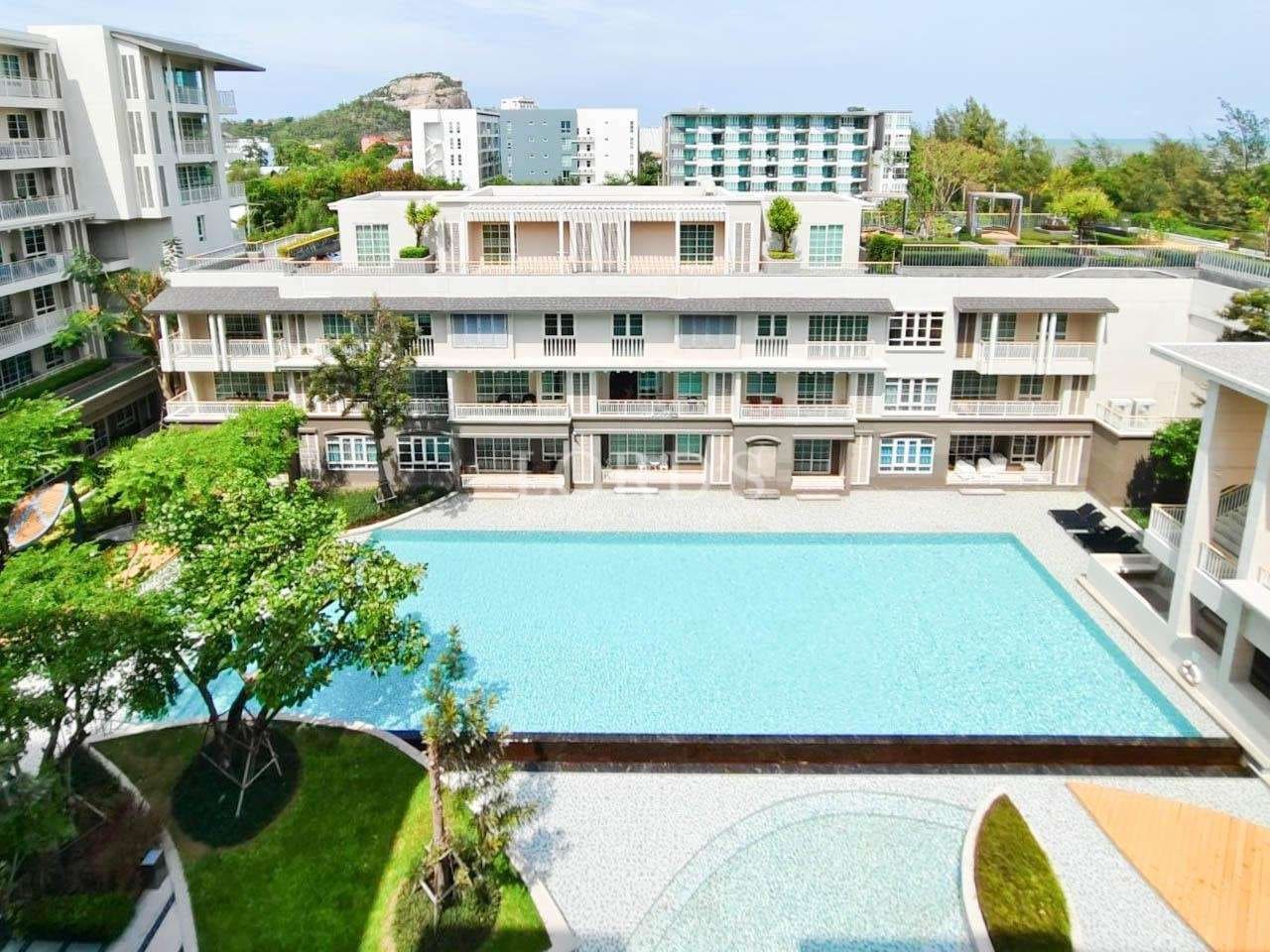 Modern building with large swimming pool