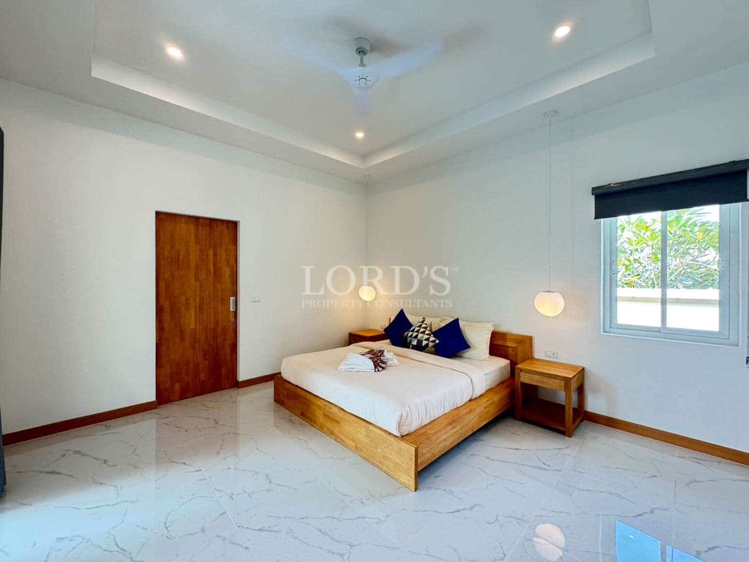 Modern bedroom with wooden furniture